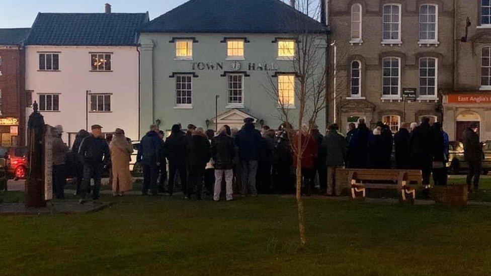 Crowd gathered in a town centre