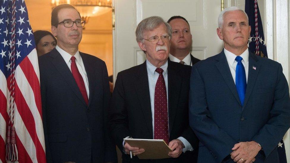 John Bolton, centre, Mr Trump's newest National Security Advisor