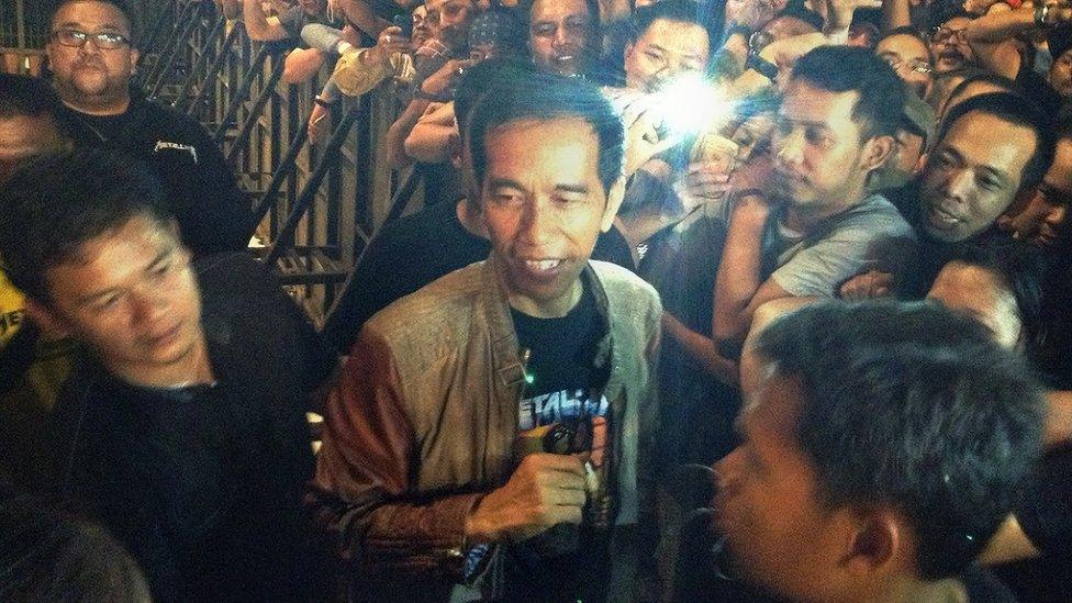 Joko Widodo attending a Metallica concert in 2013