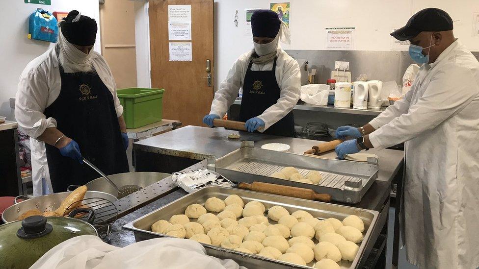 Volunteers making food