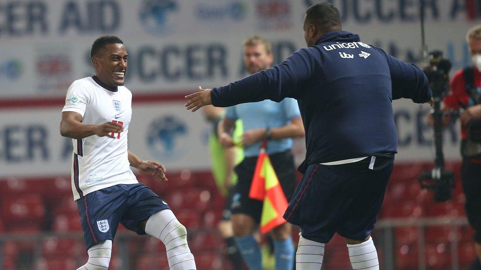 Yung Filly celebrates with Chunkz after scoring for England.