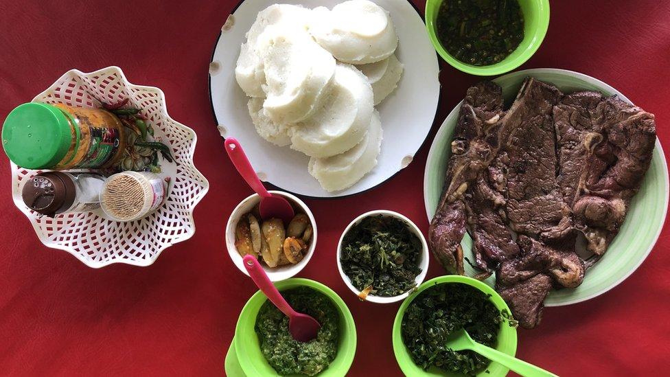 Nshima and other food on a table