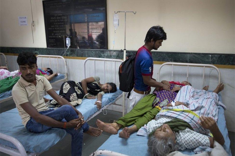 Patients receive treatment at a fever clinic especially set up to cater to those suffering from fever, one of the main symptoms of several mosquito-borne diseases, at Ram Manohar Lohia hospital in New Delhi, India, Thursday, Sept. 15, 2016