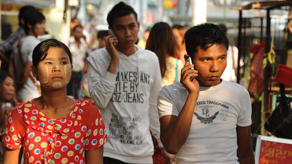 Burmese using mobile phones