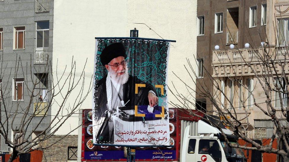 Banner depicting a portrait of Iran's Supreme Leader Ayatollah Ali Khamenei as part of a campaign to encourage people to take part in elections.