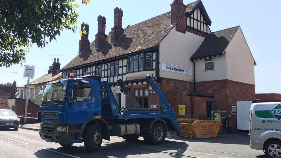 Skip at Co-op in Halstead after raid