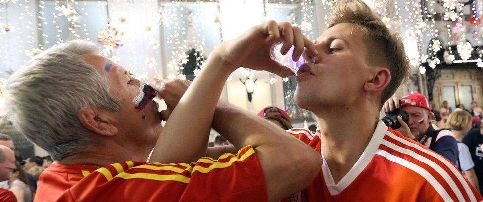 Russian fans toast victory over Spain