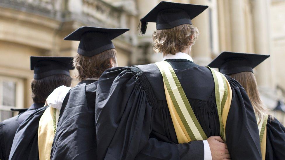 Students in graduation robes