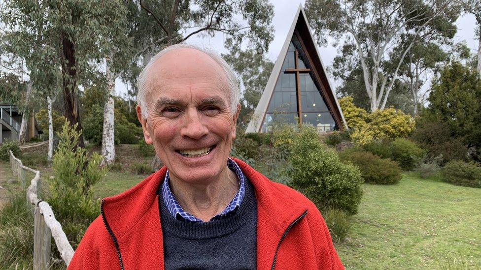 Stuart McGregor with the school's chapel in the background