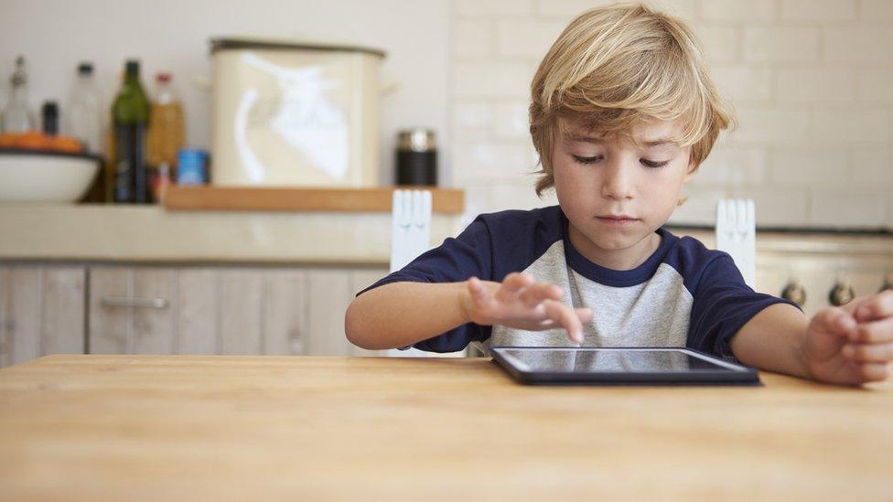 Young boy using a tablet