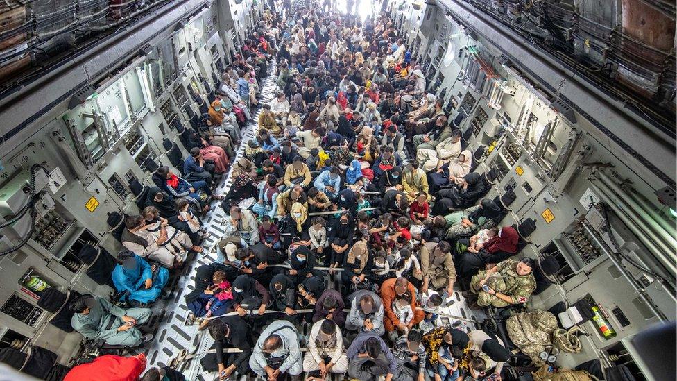 The MoD has released a picture of people on an evacuation flight out of Kabul