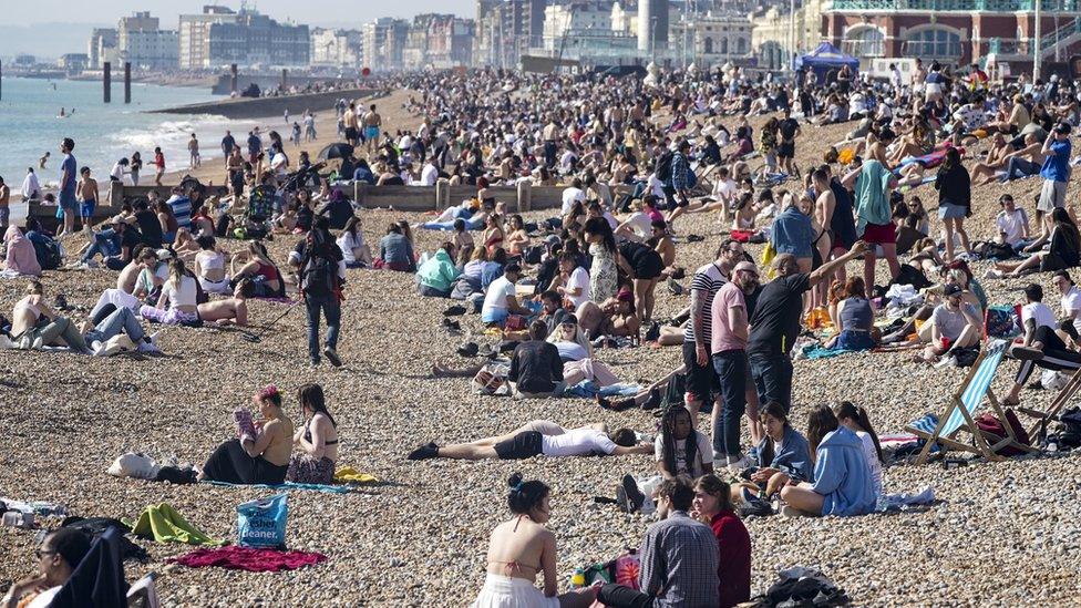 People gathered on Brighton beach on Tuesday