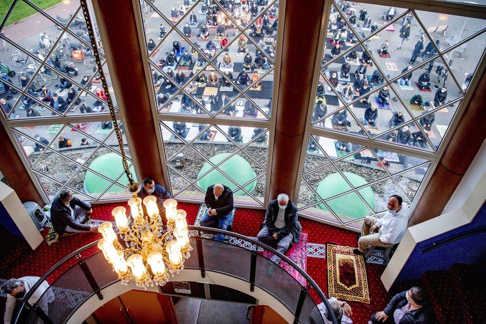 Muslims gather at the Mevlana Mosque in Rotterdam, The Netherlands, to take part in Eid prayers