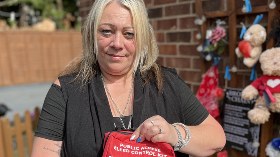 Margaret McKenna's mum holding a bleed control kit