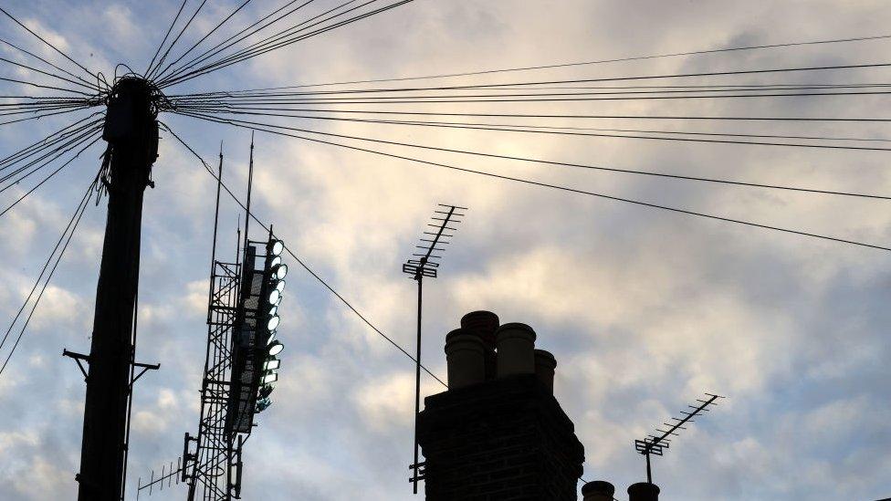 Telephone wires and mobile phone mast