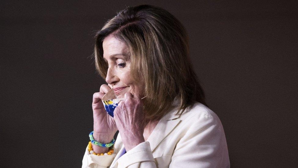 Nancy Pelosi puts on a facemask, 16 July 2020