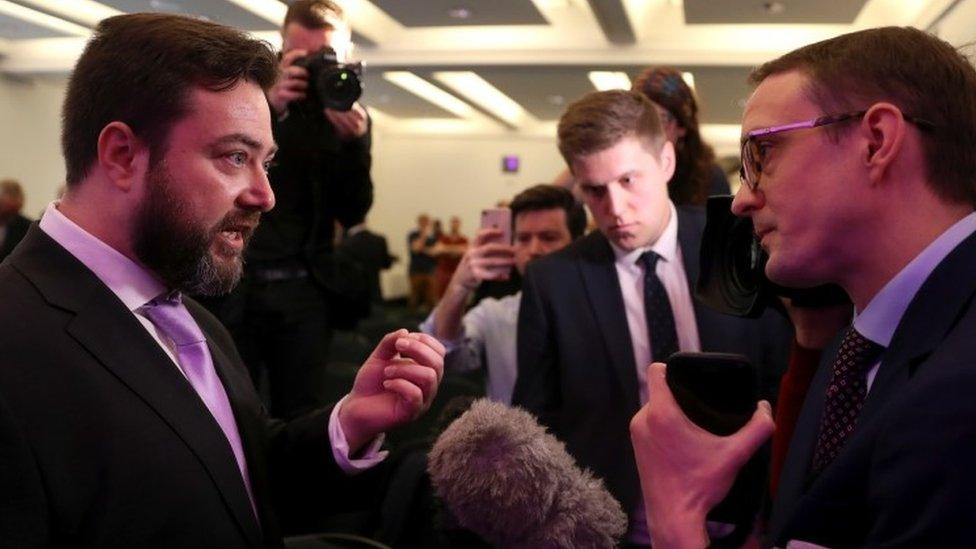 Carl Benjamin speaks to the media