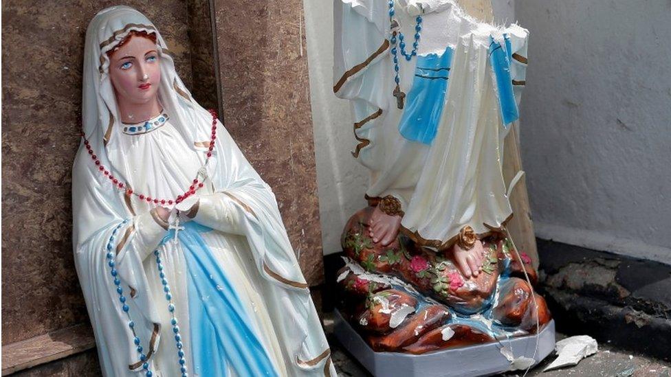 A statue of the Virgin Mary broken in St Anthony's Shrine