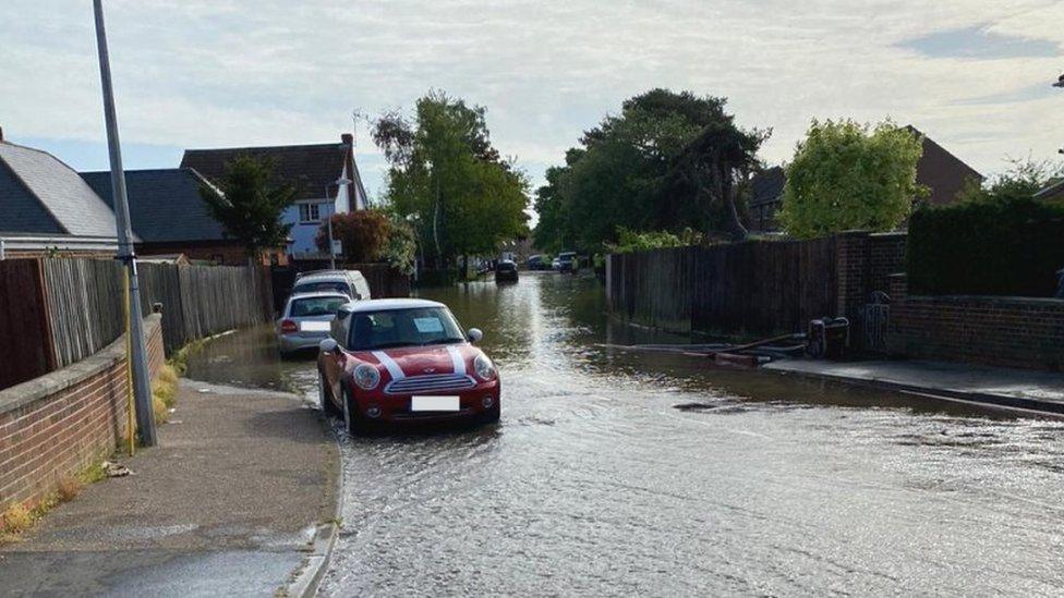 Cars in a flooded road