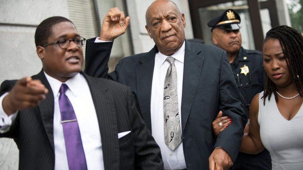 Mr Cosby (centre) alongside his two spokespeople outside the suburban Philadelphia courthouse