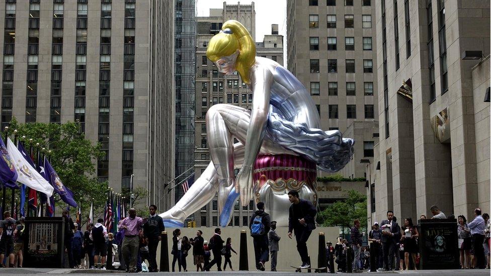 A 45 ft high inflatable ballerina created by artist Jeff Koons in the Rockefeller Center, 23 May 2017