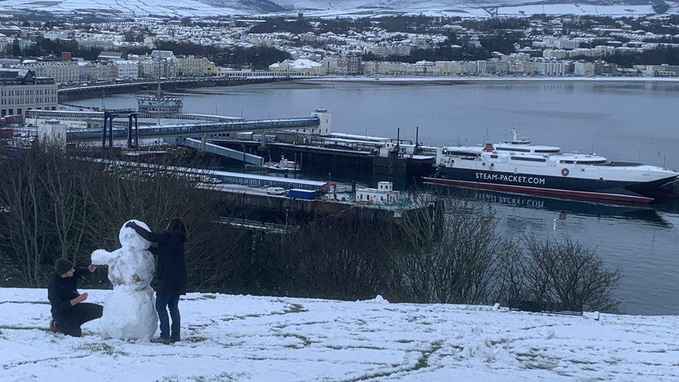 People build snowman on the Isle of Man