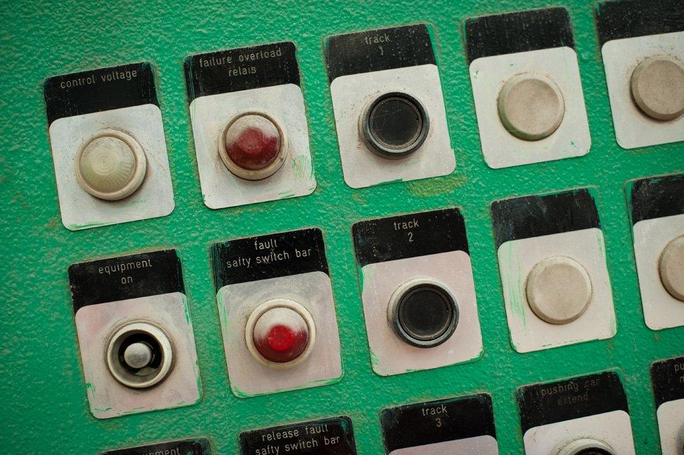 Control panel on machine in old brick plant