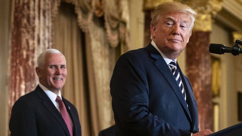 US President Donald J. Trump speaks before Mike Pompeo is sworn in as US Secretary of State, at the State Department, in Washington, DC, USA, 02 May 2018. US Vice President Mike Pence (background) looks on.