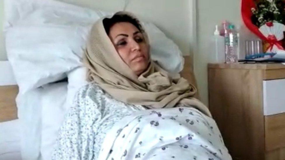 Saba Sahar lies in a hospital bed