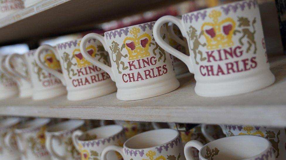 King Charles III themed mugs on display during the production of hand-decorated pieces from the forthcoming Coronation collection, at the Emma Bridgewater Pottery Factory in Stoke on Trent.