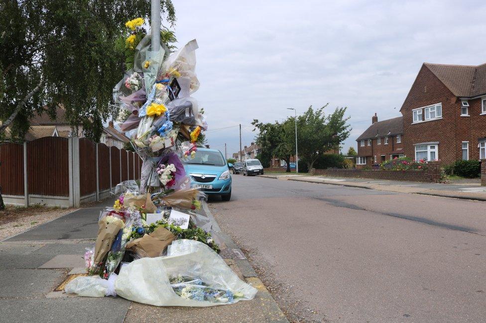 Flowers left as tributes to Kevin Malthouse