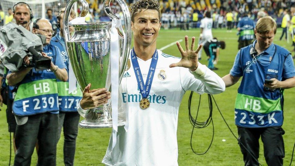 ronaldo holding champions league trophy