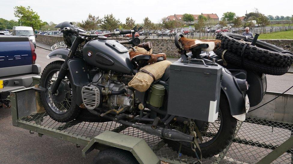 A replica SS motor bike arrives at Bamburgh Castle