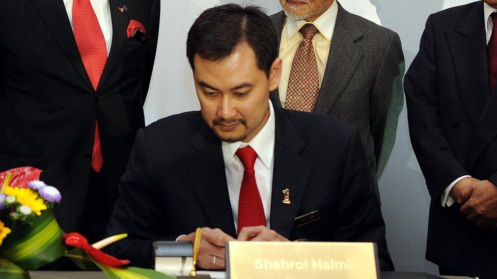 Close-up of Shahrol Azral Ibrahim Halmi at a signing ceremony in January 2010