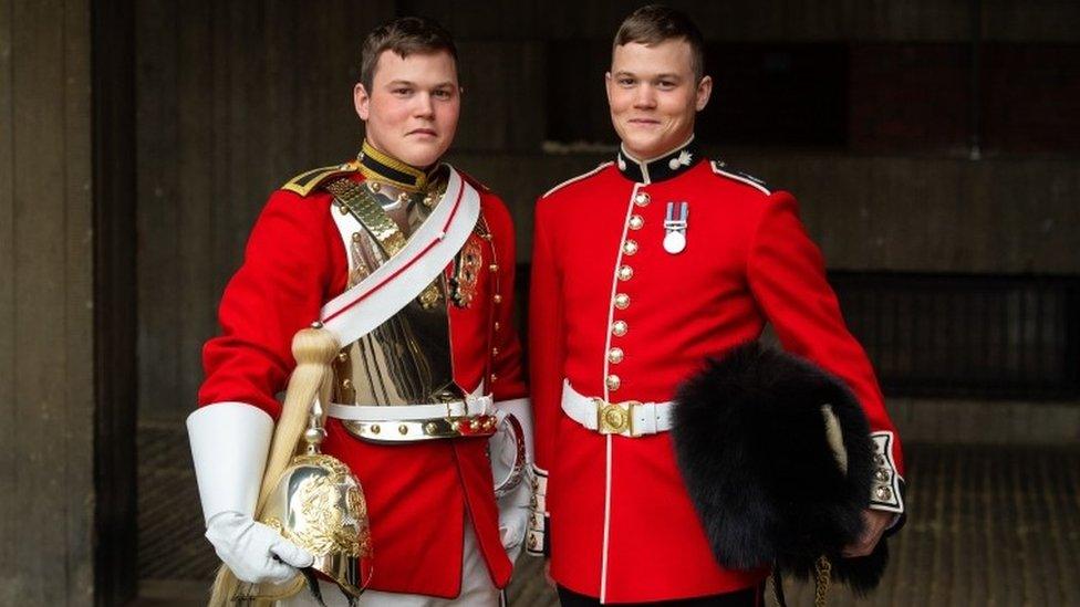 Guardsman Thomas Dell of the Grenadier Guards (right) and his twin brother Trooper Ben Dell of the Household Cavalry,