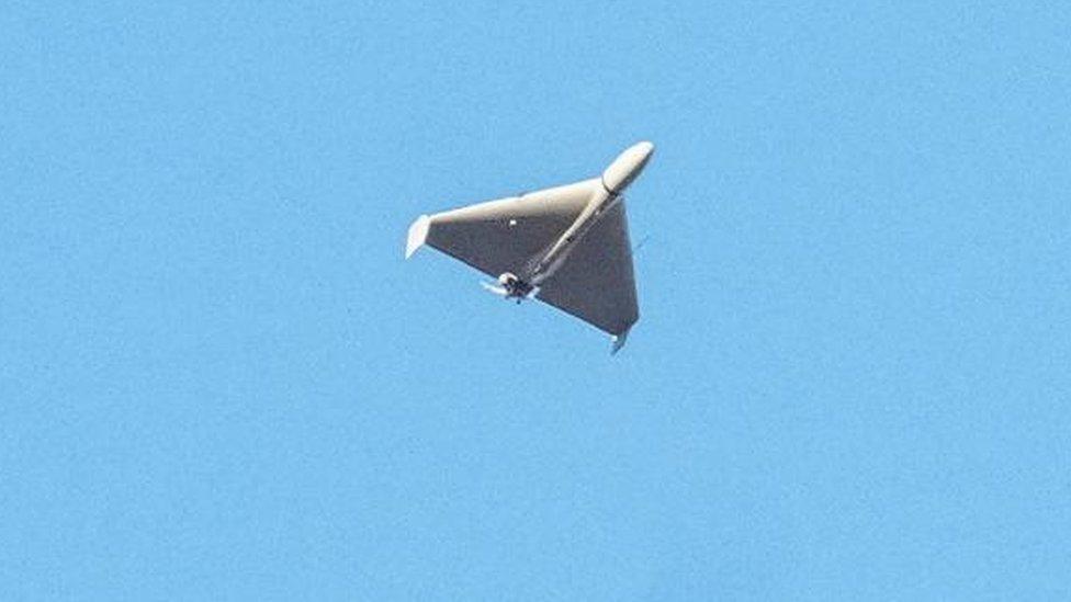 A drone, believed to be Iranian, flies above Kyiv