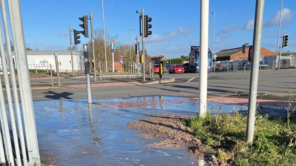 A flooded crossing point over Ashby Road West