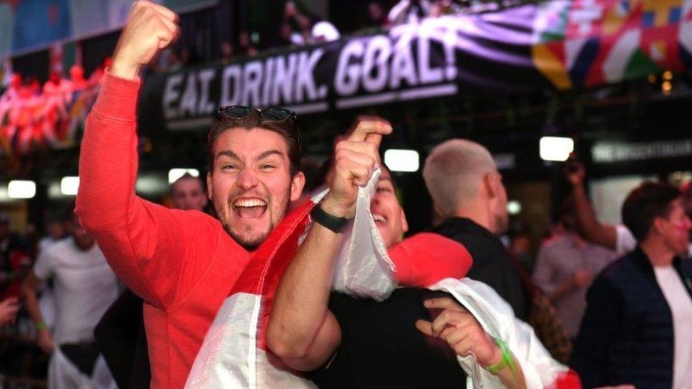 Fans celebrate Luke Shaw's goal in Croydon