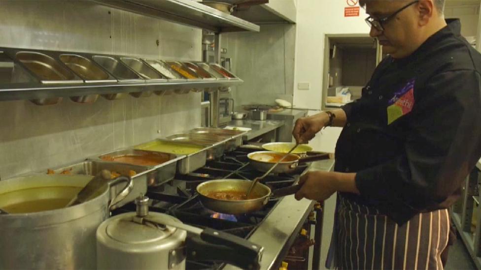 Cook preparing Indian food