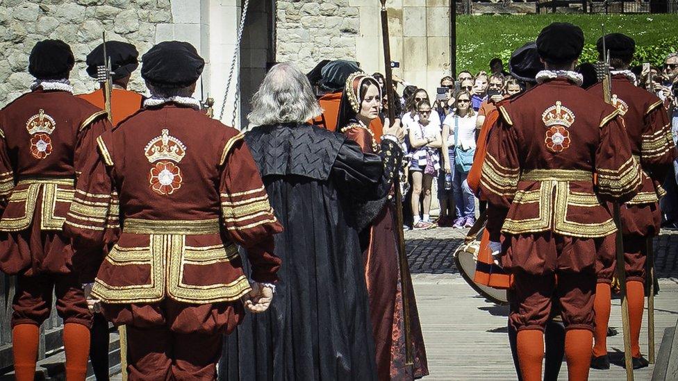 Anne being led from her quarters to Tower Green