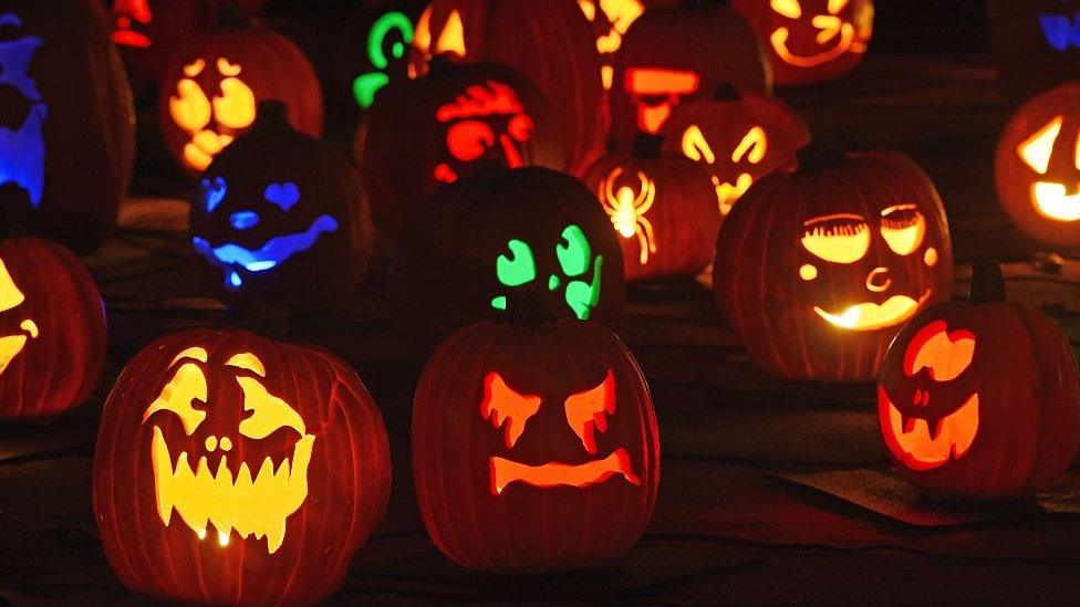 Jack-o'-lanterns are displayed at the 'Rise of the Jack OLanterns' exhibition, featuring more than 5,000 hand-carved, illuminated pumpkins created by professional artists and sculptors in La Canada Flintridge