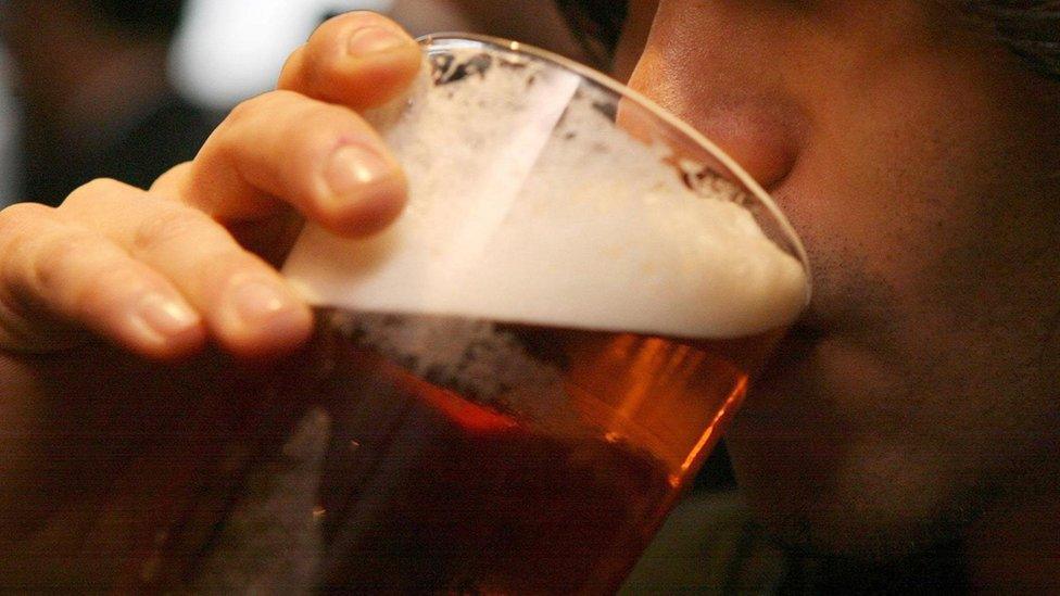 Man drinking a pint