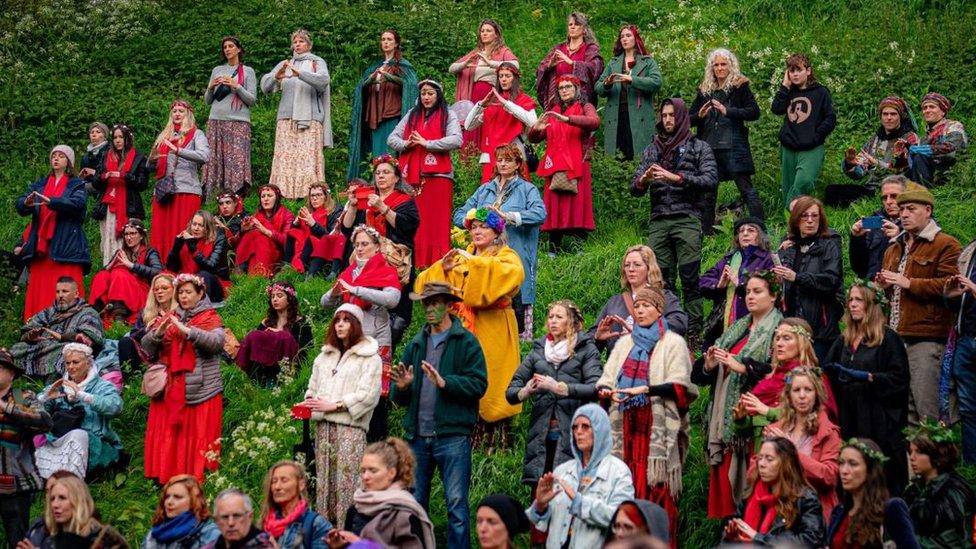 A group of people in bright clothes