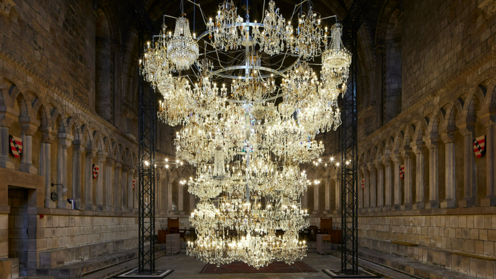 Illuminated Bottle Rack artwork by Ai Weiwei inside Durham Cathedral