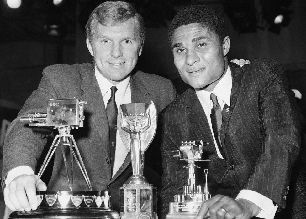 Bobby Moore (left) and Portuguese footballer Eusebio at the BBC Television Theatre, London, with their trophies at the BBC Sports Personality of the Year Awards