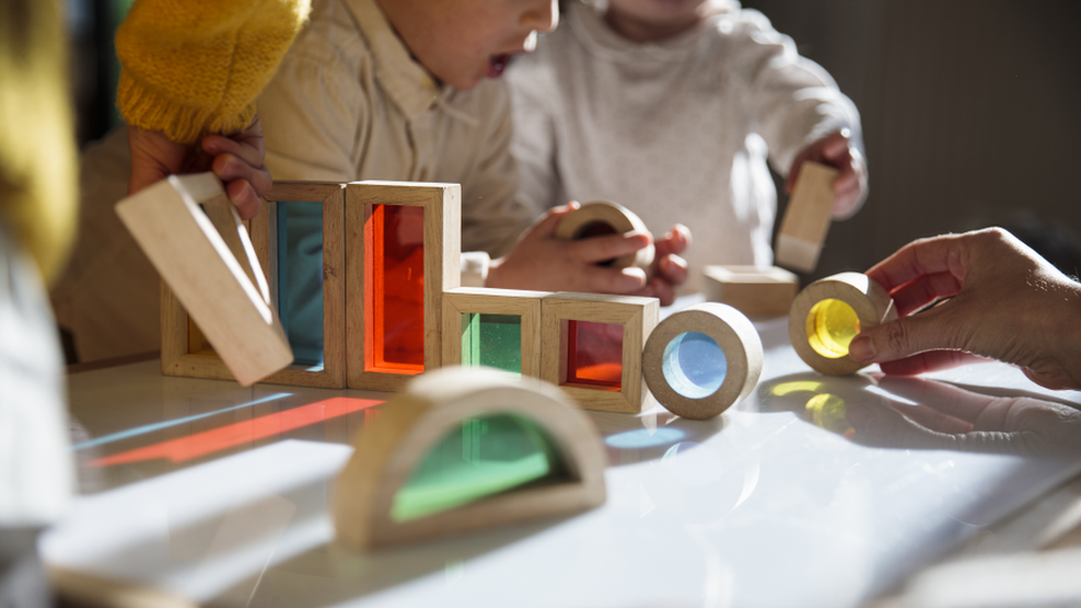 Children play with blocks