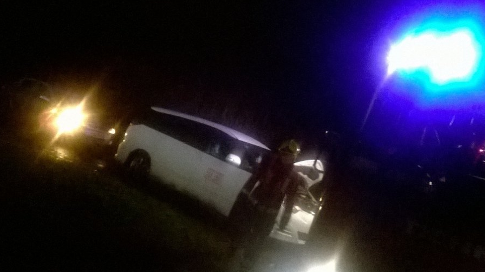 A car stuck in flood water in Kings Norton