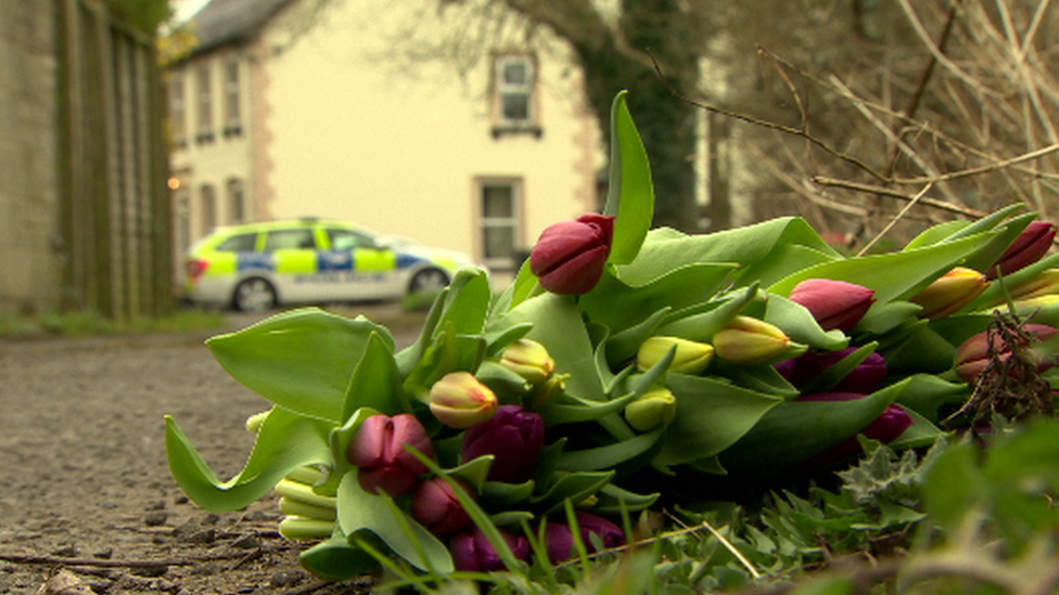 Floral tributes left at the scene