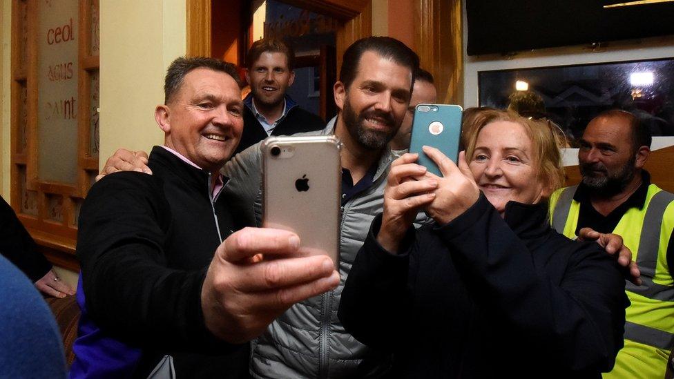 US President Donald Trump's sons Eric and Donald Trump Jr visit a local pub in Doonbeg