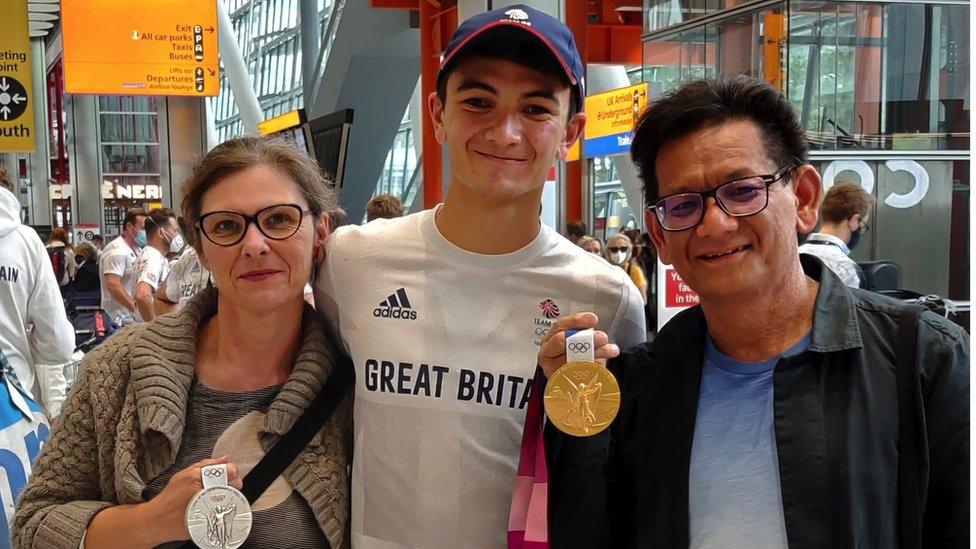 Alex with his mum and dad